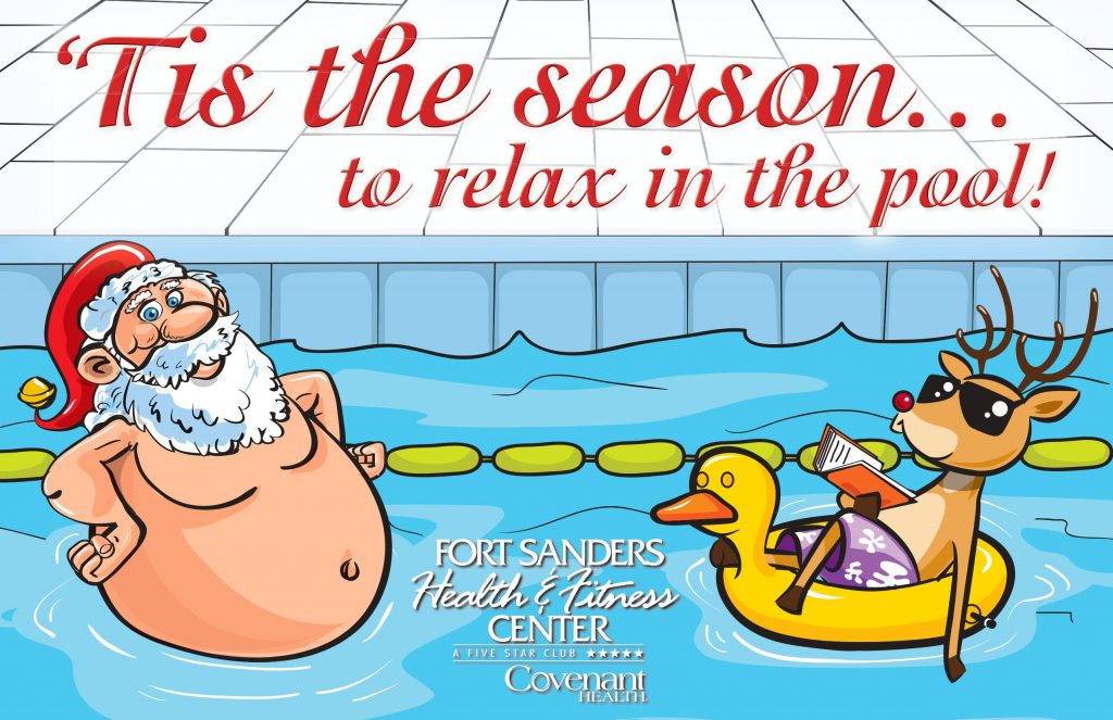 Fat Santa Claus wearing hat standing in pool with a reindeer floating in a rubber duck pool float